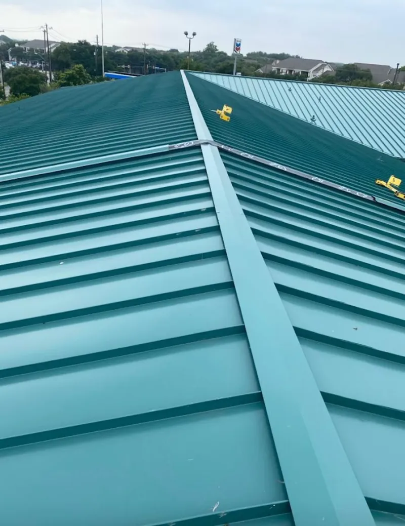 Green commercial metal roof ridge and valley for Metal Roof Repair in World Golf Village